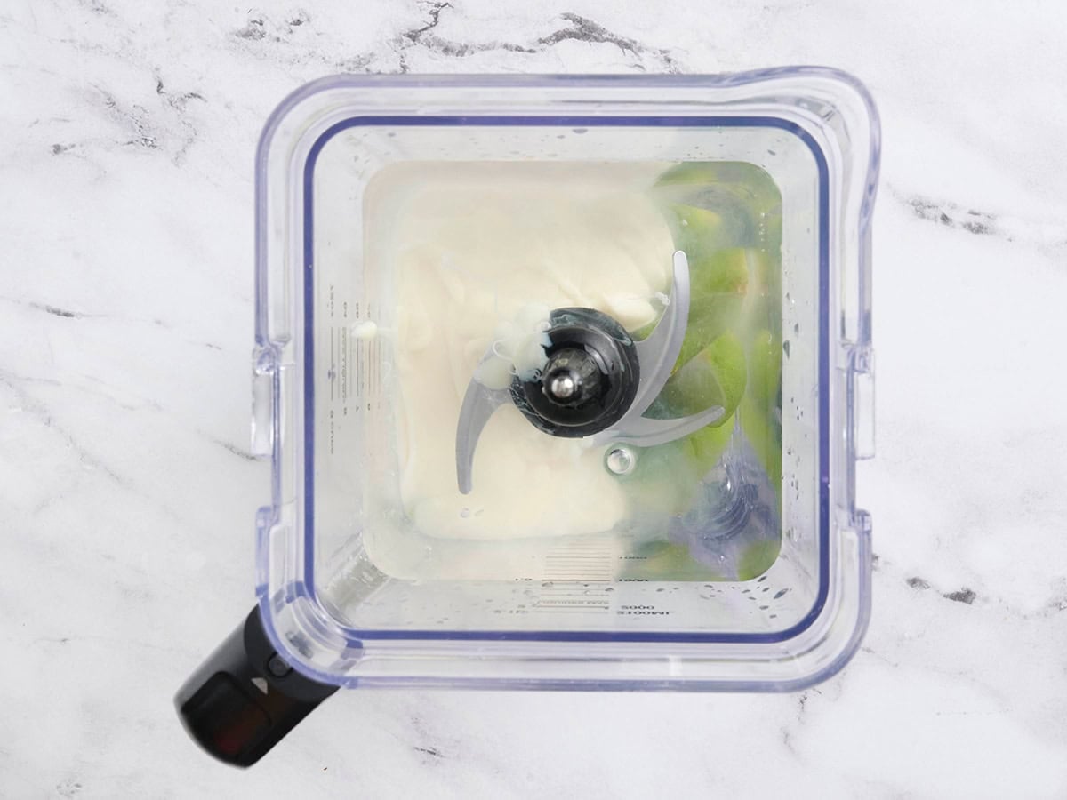 The ingredients for Brazilian lemonade in a blender.