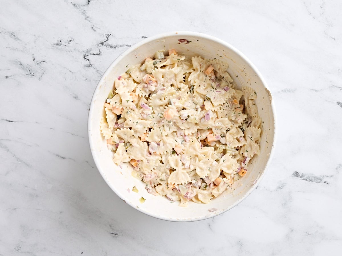 Overhead view of a bowl of dill pickle salad.