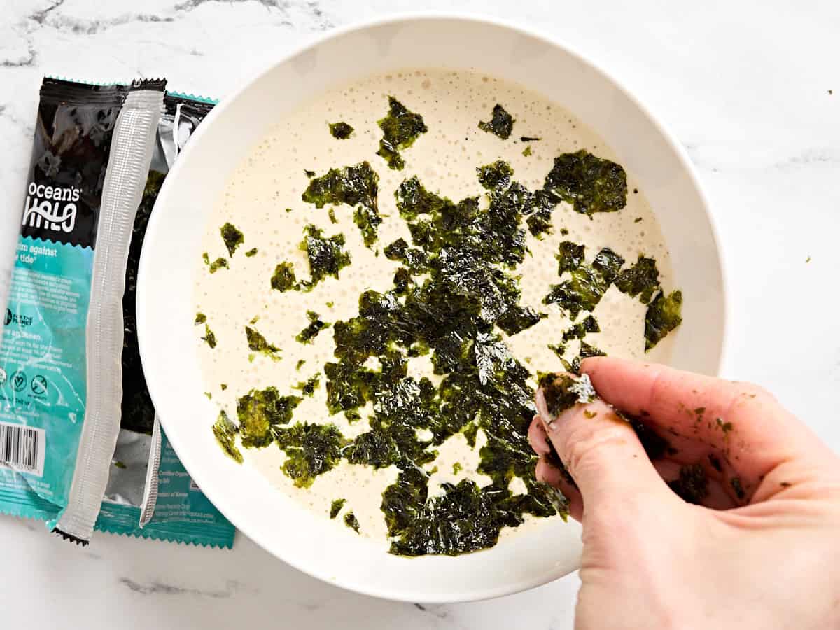 Crushed seaweed added to a homemade vegetarian caesar dressing.