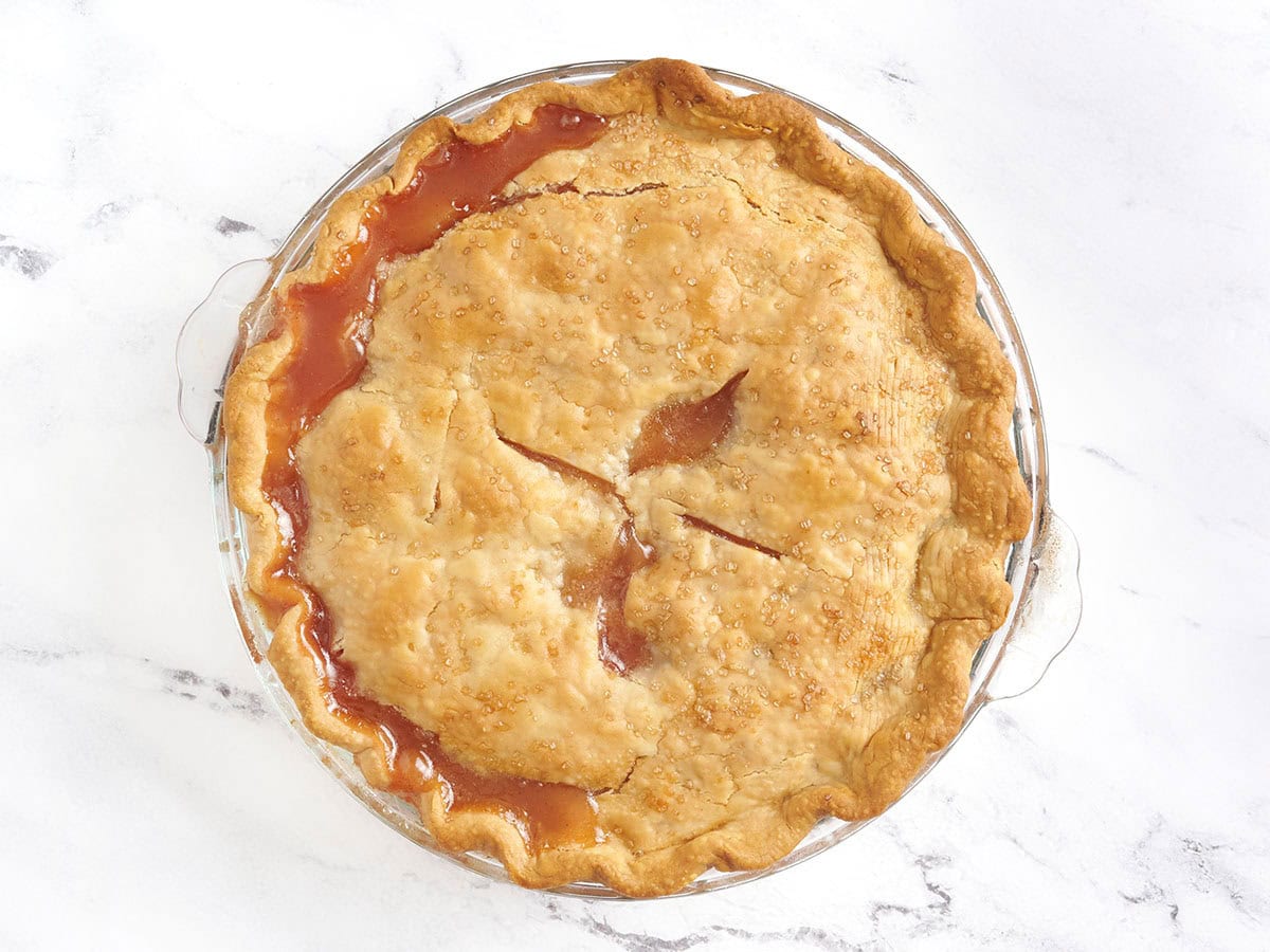A freshly baked fresh peach pie.