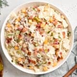 Overhead view of a bowl of dill pickle pasta salad in a bowl.