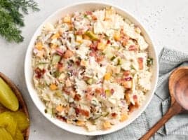 Overhead view of a bowl of dill pickle pasta salad in a bowl.