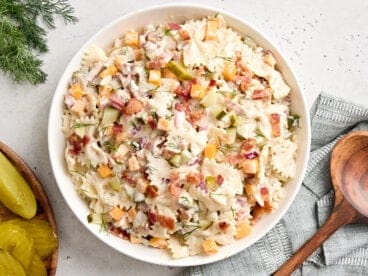 Overhead view of a bowl of dill pickle pasta salad in a bowl.