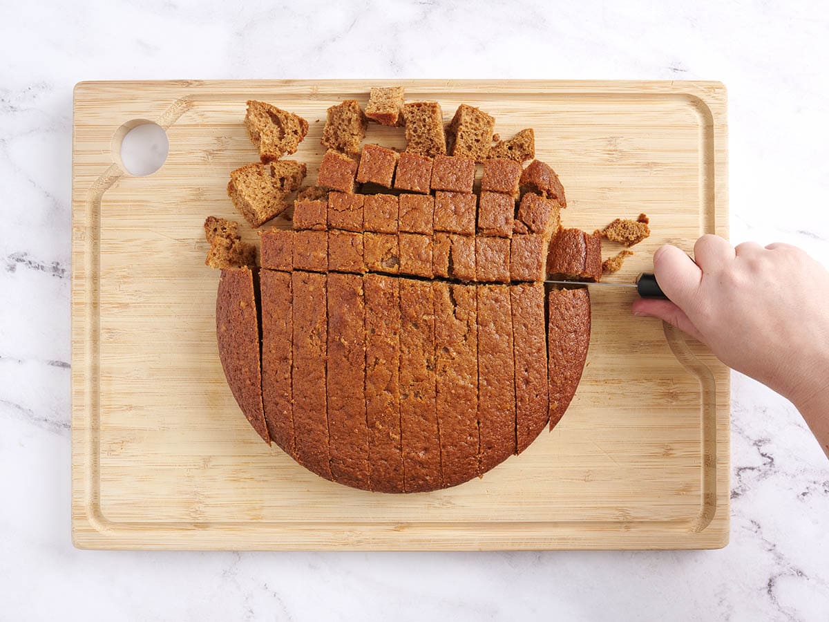 A homemade spiced cake sliced into cubes.
