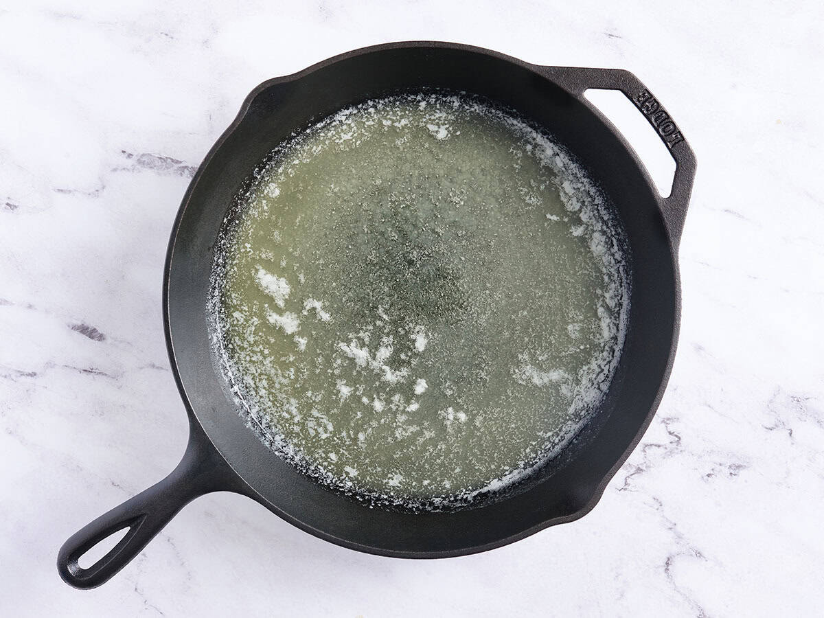 Melted butter in a skillet.