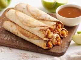 A stack of homemade apple flautas.