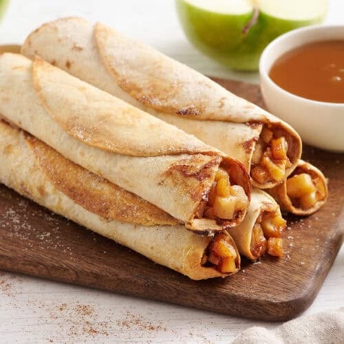 A stack of homemade apple flautas.
