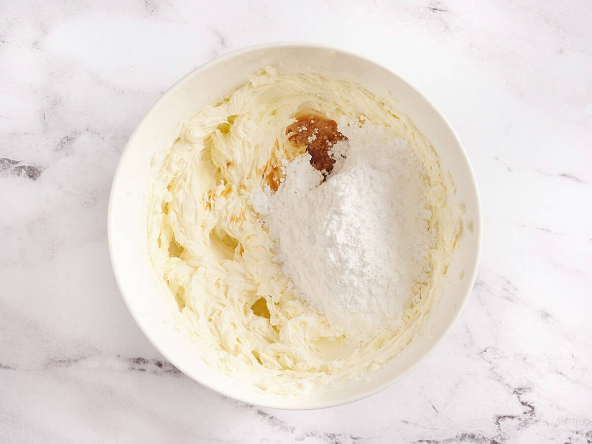 ingredients being combined to make pumpkin roll