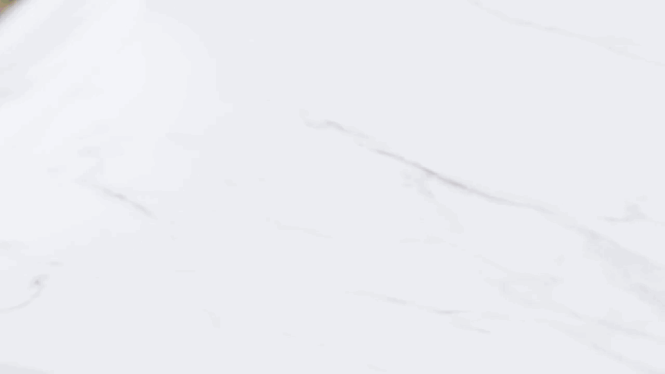 ratatouille dish transferred to oven and then getting cheese sprinkled on it