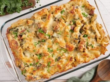 Overhead view of a turkey sausage and kale casserole in a baking dish.