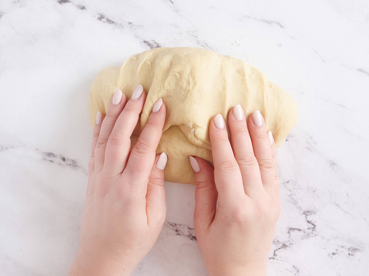 Kneading the dough.