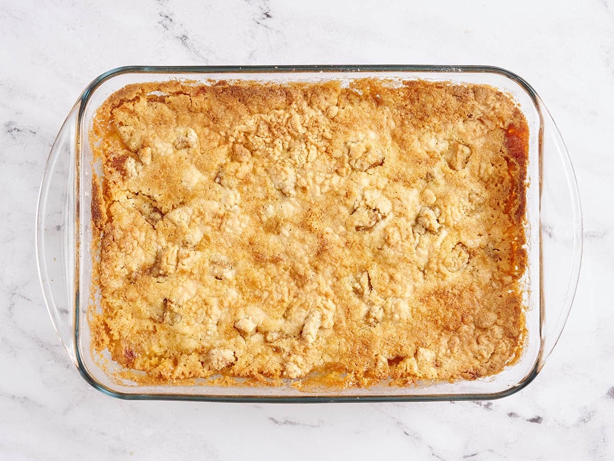 A homemade apple dump cake in a baking dish.