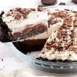 Side view of a Mississippi Mud Pie with a slice being taken.