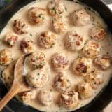 chicken meatballs in cream sauce in skillet