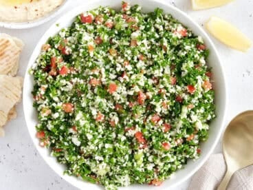 Overhead view of a bowl of fresh cauliflower tabbouleh.