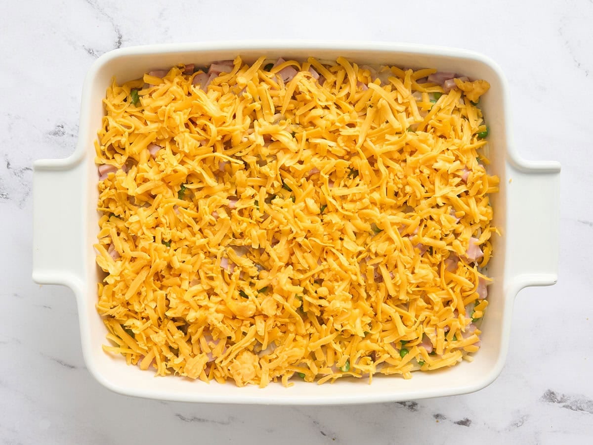 A homemade ham tetrazzini in a casserole dish.