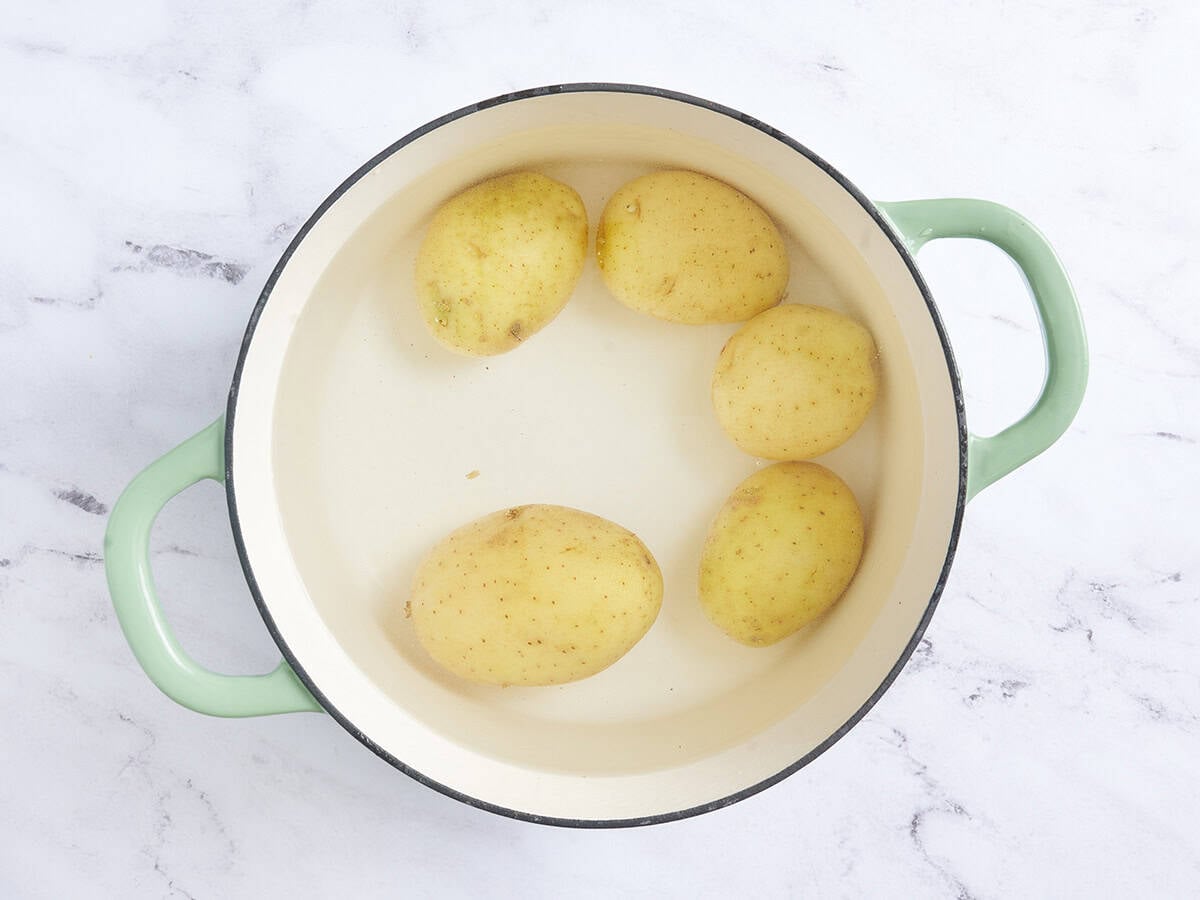 Boiled potatoes in a pot.