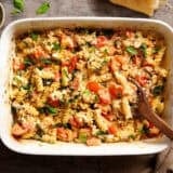 Overhead view of feta pasta in a baking dish.