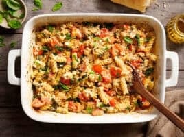 Overhead view of feta pasta in a baking dish.