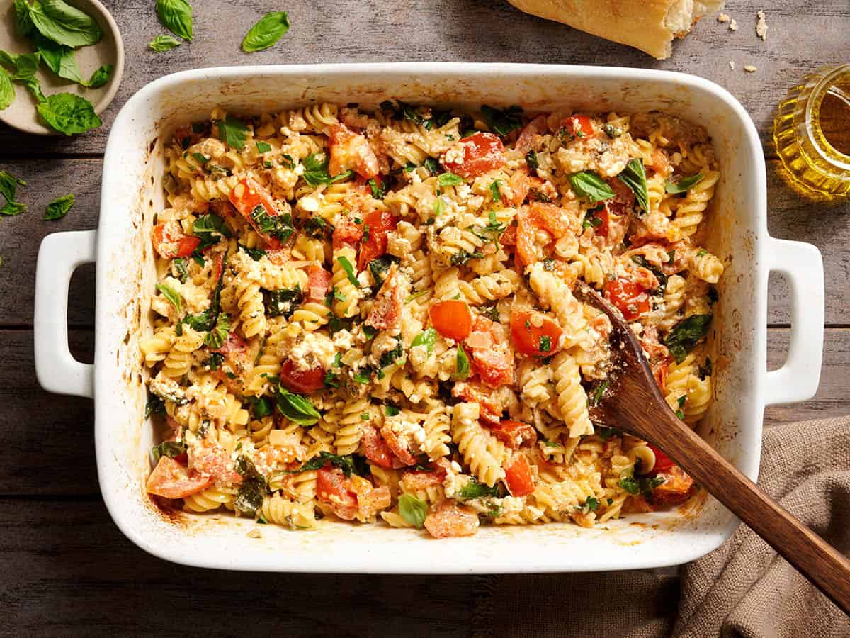 Overhead view of feta pasta in a baking dish.