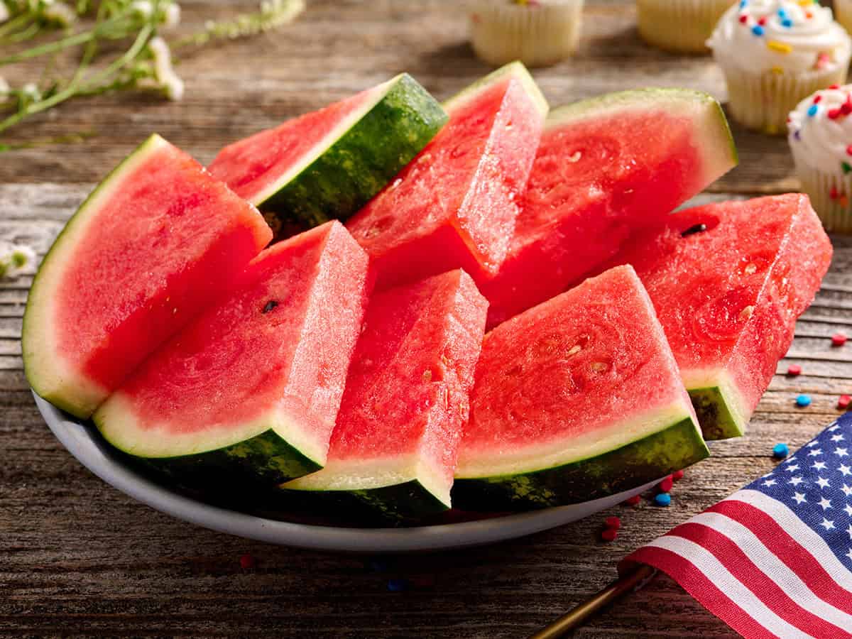 Slice view of a plate of watermelon slices.