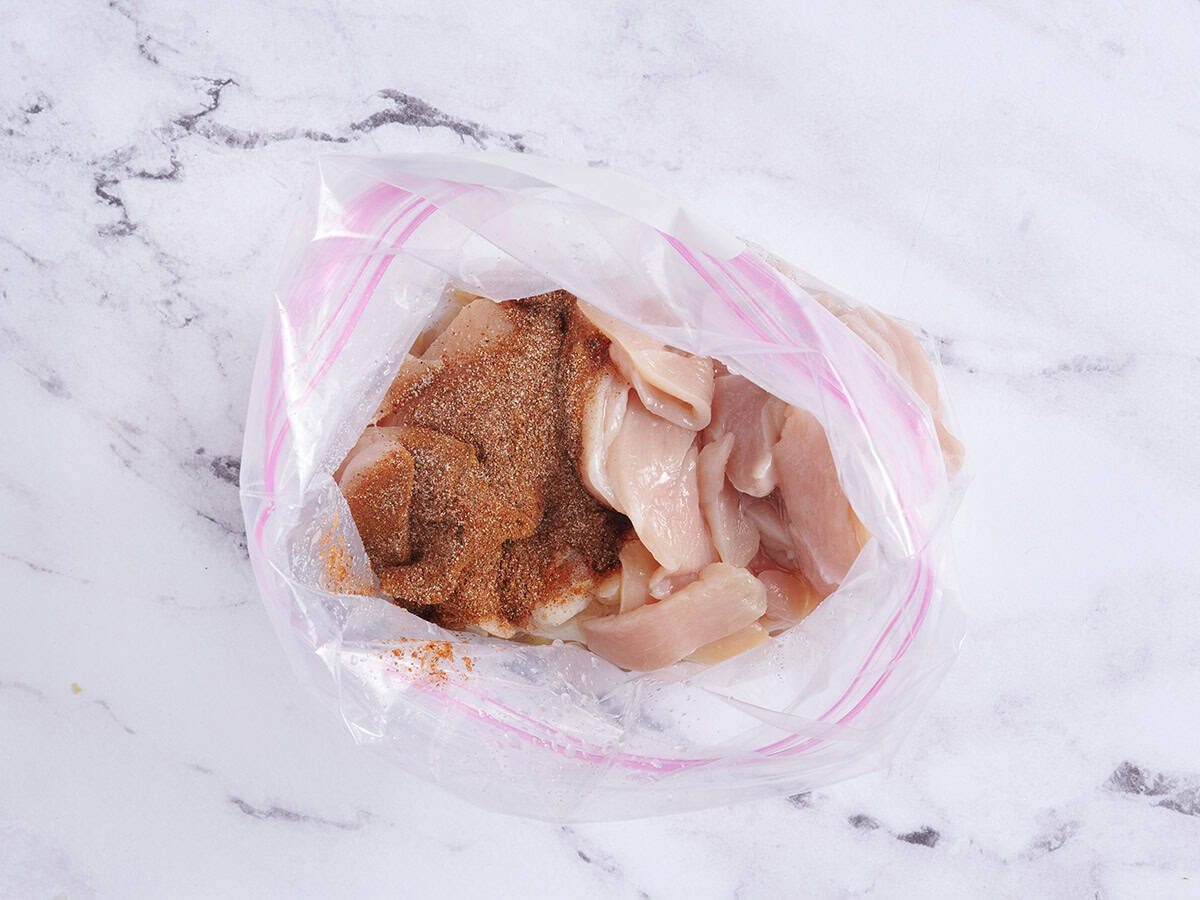 Chicken and fajita seasonings in a zip-top bag.