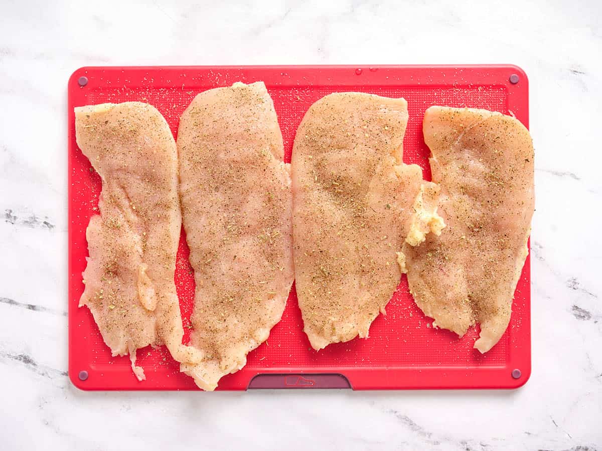 Four chicken breast cutlets.